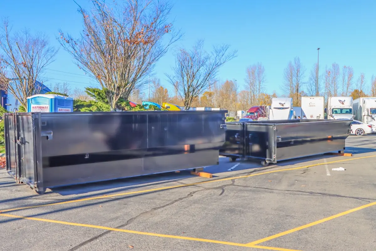 Professional dumpster rental service with roll-off container on residential driveway in Incline Village